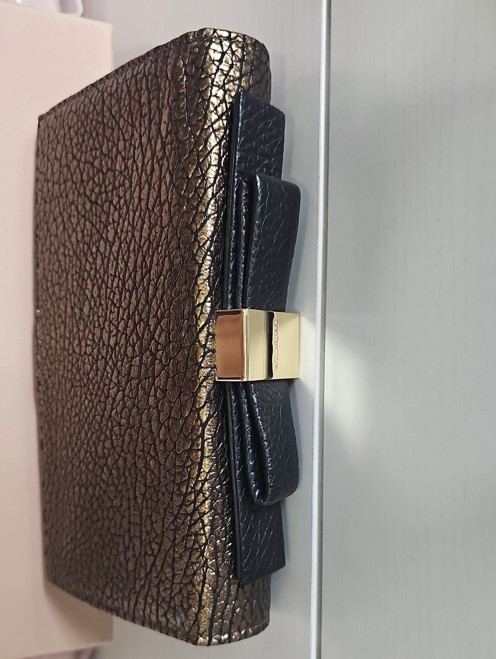 See By Chloe Metallic Bronze Crossbody Clutch with Black Bow and Gold Hardware